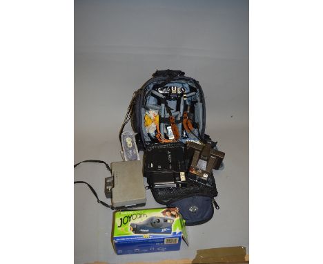 A CAMERA RUCK SACK AND A BOX OF OLYMPUS AND POLAROID CAMERAS AND EQUIPMENT, these include an OM10 with T20 flash, a Sunagor S