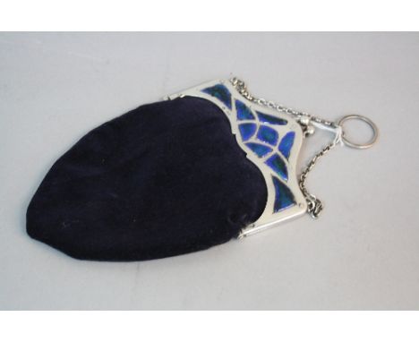 AN EDWARDIAN SILVER, ENAMEL AND VELVET BAG, short chain with finger loop, the front of the bag with an Arts & Crafts style in