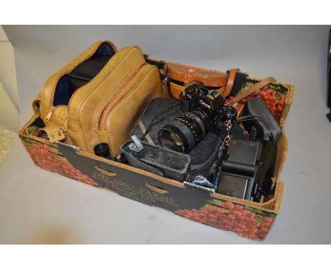 A BOX OF PHOTOGRAPHIC EQUIPMENT, including a Canon A-1 SLR body fitted with a Vivitar 35-105mm 1:3.5 Zoom lens, a Canon Speed