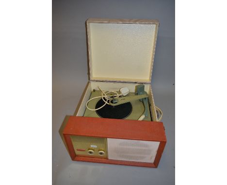 A STELLA VINTAGE RECORD PLAYER, in orange and pink finish with a Philips turntable finished in green