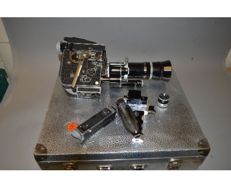 A BOLEX PAILLARD H16 REFLEX FILM CAMERA, fitted with a 86mm 1:2.5 lens with handle and viewer and aluminium case, there are o