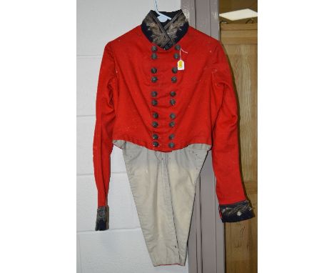 AN 1820'S TAILCOAT, attributed to the Lord Lieutenant of Wales K.J.Carpenter of Carreglwyd, Anglesey, the coat is in red with