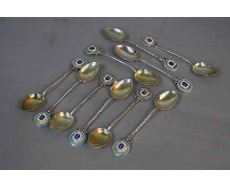 TEN GEORGE V AND VI SILVER AND ENAMEL SANDWELL PARK GOLF CLUB TEASPOONS, enamelled finials, gilt bowls, makers Marples & Beas