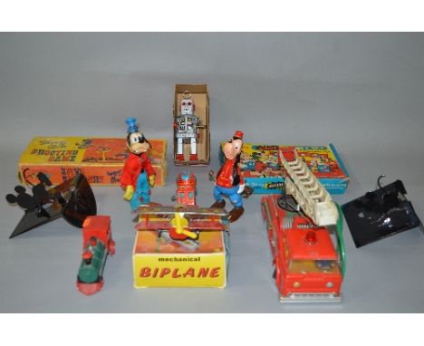 A BOXED WELSOTOYS WALT DISNEY ACTION TARGET SET, No.168, lithographed tinplate and plastic target with plastic gun, missing c