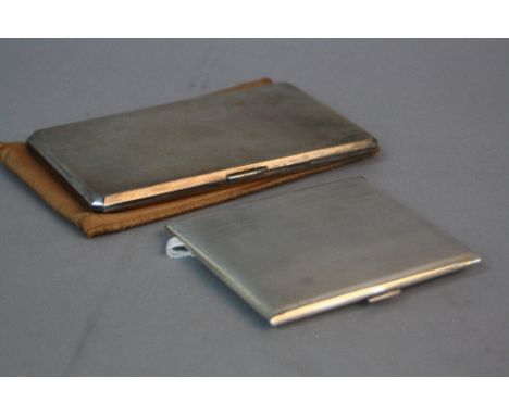 AN ELIZABETH II RECTANGULAR SILVER CIGARETTE CASE, engine turned decoration, canted corners, maker WH Manton Ltd, Birmingham 