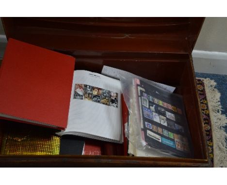 AN ALL WORLD ACCUMULATION OF STAMPS, in eighteen binders, stockbooks and loose contained in a tin trunk with mint Great Brita