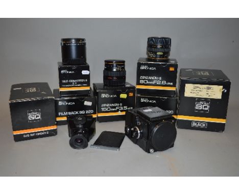 A BOXED ZENZA BRONICA SQ MEDIUM FORMAT SLR CAMERA, a boxed 150mm 1:3.5 Zenzanon-S lens, a boxed 80mm 1:2.8 Zenzanon-S lens, a