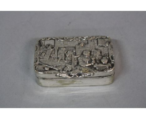 A 19TH CENTURY CONTINENTAL WHITE METAL RECTANGULAR SNUFF BOX, the hinged cover cast with a Dutch style tavern interior scene,