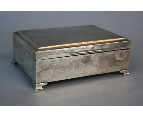 A MODERN SILVER CIGARETTE BOX, of rectangular form, engine turned top, on ogee bracket feet, bears import marks for Birmingha