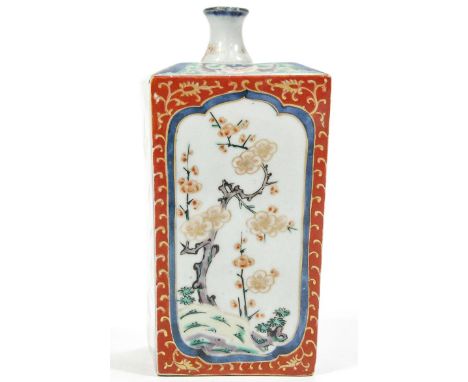 A Japanese stoneware flask, of rectangular form, decorated with panels of prunus and flowers, 20cm high