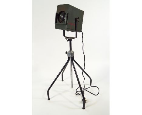 A stage light, with front slot for coloured filters, on an adjustable stand, max height 142cm.