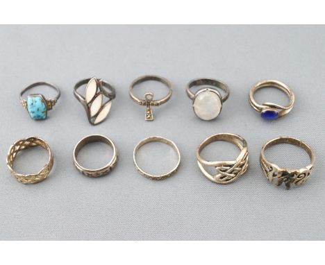 A collection of ten silver rings of variable designs. Size range from L to R. gross weight: 40.3 grams