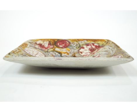 A bowl by Marianne de Trey, the stoneware square form body polychrome glaze decorated with stylised roses, impressed Studio m