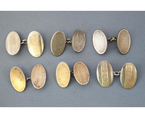 A selection of three pairs of chain link cufflinks. One pair marked silver, two marked 9ct gold and silver. Gross weight: 23.