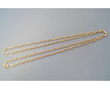 A yellow metal trombone linked chain, 800mm. Bolt ring clasp. Hallmarked 9ct gold, Import London, 1979. 12.3 grams