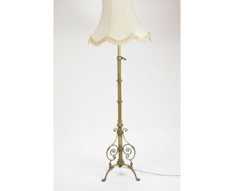 A Hart, Son, Peard &amp; Co of London, brass extending standard lamp, with a lever mechanism from 116 to 173cm high, the main