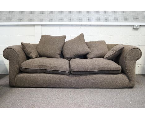 A hand made Conran design sofa, of large proportions with rolled back and arms with two seat cushions and a selection of scat