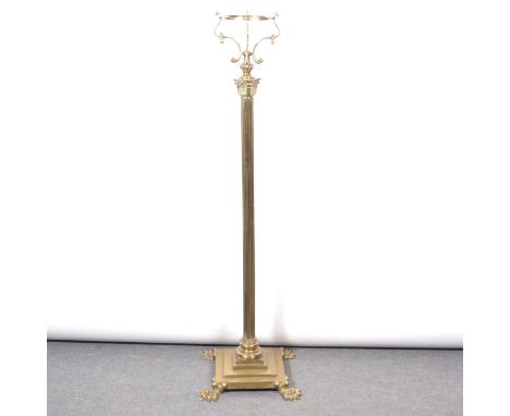 Brass Corinthian column standard lamp, oil lamp fitting converted to electricity, stepped square base on paw feet, 155cm.