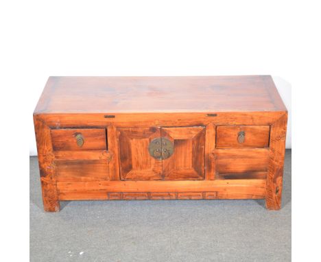 Modern Chinese hardwood low cabinet, rectangular form, central cupboard flanked by drawers, width 102cm, depth 42cm, height 4