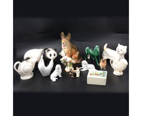 A panda, bearing Beswick mark, 12cm; an Alsatian, bearing Beswick trial edition mark, 23cm; a Capodimonte figure of a young c