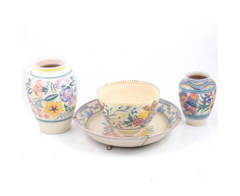 A Poole Pottery charger, with Carter Stabler Adams Ltd mark and initials ER to base, 37cm; a bowl, 15cm; and two vases, 25cm 
