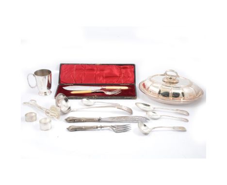 Silver-plated entree dish with a detachable handle, christening mug, soup ladle, pair of sauce ladles, cased set of fish serv