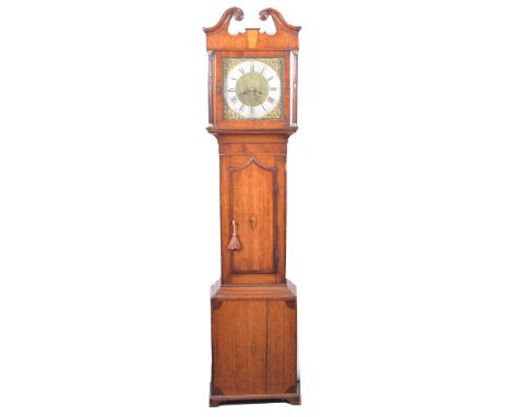 Oak and mahogany longcase clock, the hood with swan neck pediment, turned columns, the door with shell inliay, bracket feet, 