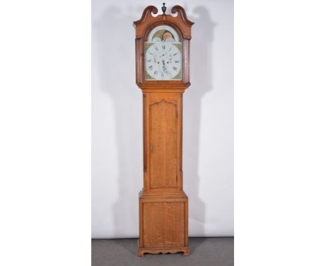 Oak longcase clock, the hood with urn finial, swan neck pediment, fluted supports, the case with long door flanked by quarter