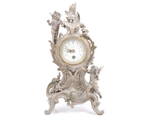 French metal mantel clock, the case with frolicking cherubs, enamelled dial, cylinder movement non-striking, 27cm.