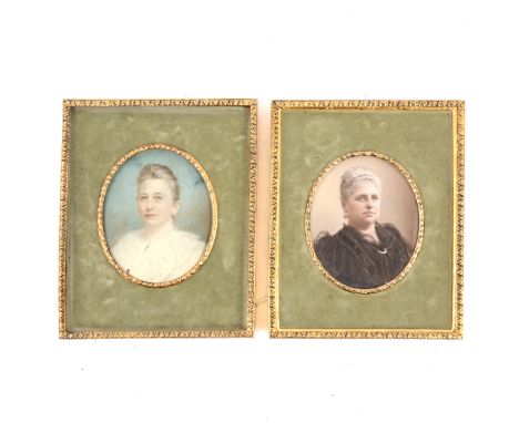Two late Victorian tinted portrait miniatures, 7x6cm, brass and velvet frames.