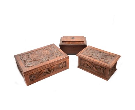 A George III mahogany tea caddy (lacking feet), 26cm; and two carved wooden boxes, one dated 1895.