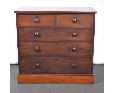 Victorian mahogany chest of drawers, rectangular top, two short and three long graduating drawers, turned handles, plinth bas