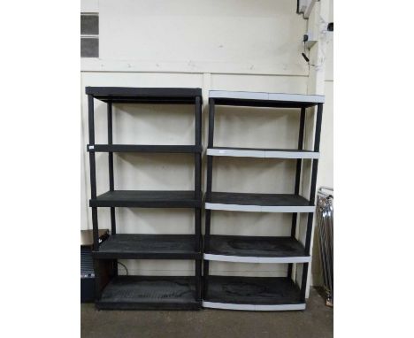 Two black plastic shelf units