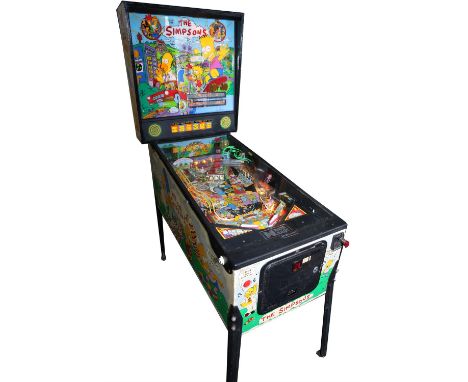 DATA EAST, a pin ball machine, featuring The Simpsons, circa 1990, with accessories including manual. Note: The game play and