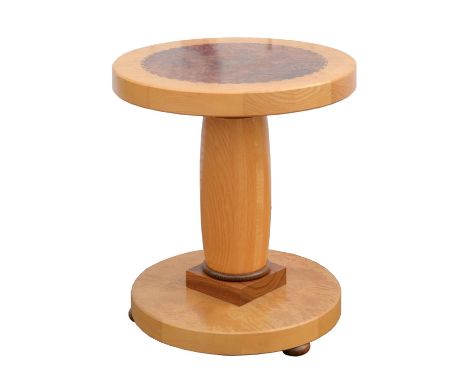 ANDREW VARAH (BRITISH CONTEMPORARY), a circular table, on turned column, with circular base,, on bun feet, burr ash and black