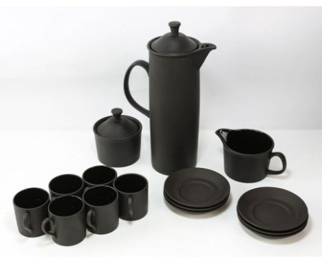 WALTER ROBERT MINKIN FOR WEDGWOOD, a black basalt coffee service, c. 1963, comprising cylindrical coffee pot, sucrier and cov