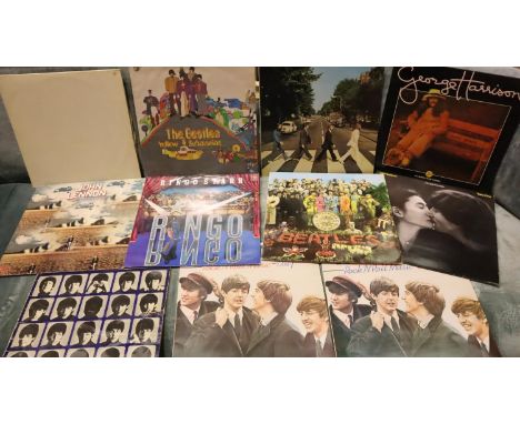 Mixed Beatles LPs including Sgt Pepper and Help. P&amp;P Group 2 (£18+VAT for the first lot and £3+VAT for subsequent lots) 