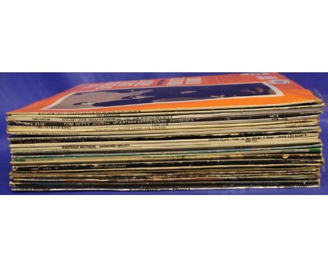 Collection of mixed vinyl including Tom Petty and Moody Blues. P&amp;P Group 3 (£25+VAT for the first lot and £5+VAT for subs