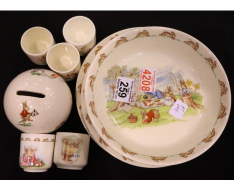Royal Doulton Bunnykins; four plates, two bowls, five egg cups and a money box. Not available for in-house P&amp;P, contact P