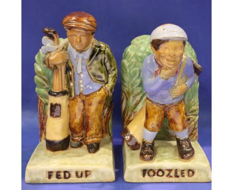 Pair of Doulton Lambeth golfing related ceramic bookends, H: 15 cm, possible chip to Fed Up figurines mouth but beneath glaze