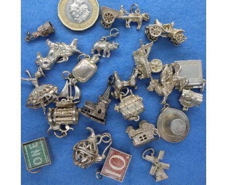 Collection of mixed silver charms (22), 77g. P&amp;P Group 1 (£14+VAT for the first lot and £1+VAT for subsequent lots) 