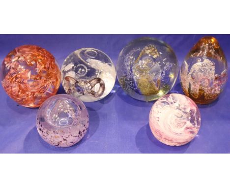 Four Caithness glass paperweights and two others including a Teign Valley Glass example. P&amp;P Group 2 (£18+VAT for the fir