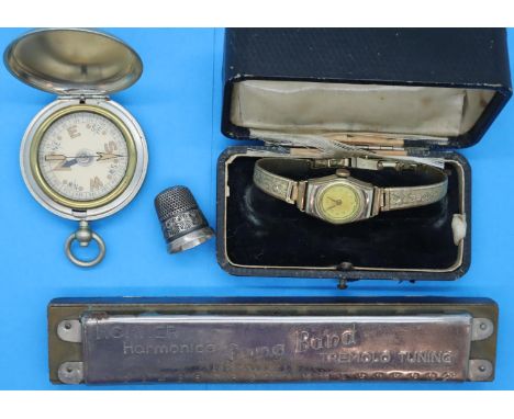 Rolled gold ladies wristwatch, silver thimble, harmonica and a compass. P&amp;P Group 1 (£14+VAT for the first lot and £1+VAT