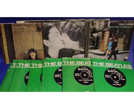 Twenty seven Beatles and related singles. P&amp;P Group 1 (£14+VAT for the first lot and £1+VAT for subsequent lots) 