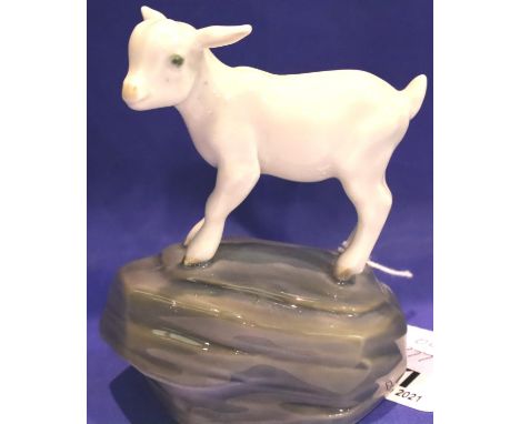 Royal Copenhagen goat kid on rock figurine, H: 12 cm. P&amp;P Group 2 (£18+VAT for the first lot and £3+VAT for subsequent lo