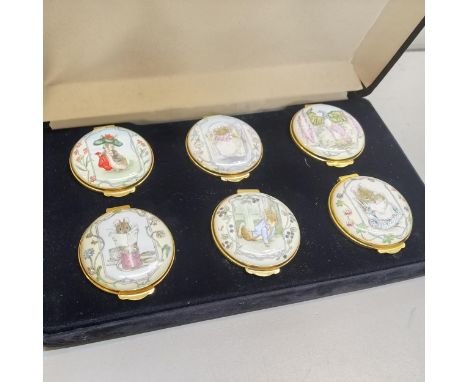 A cased set of six Crummles &amp; Co Exclusively commissioned for Royal Doulton Beatrix Potter Peter Rabbit, circular enamel 