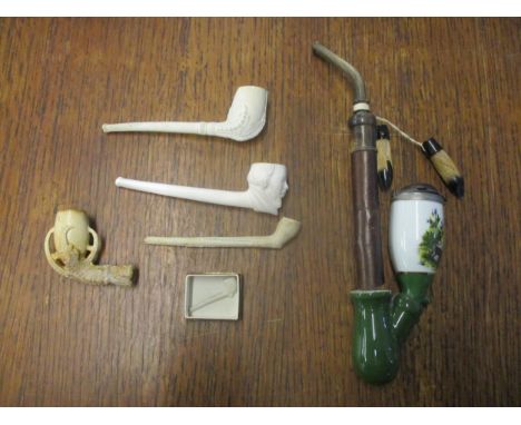 A group of pipes to include clay, Meerschaum, and a Bavarian porcelain and wood pipe Location: 7.2 