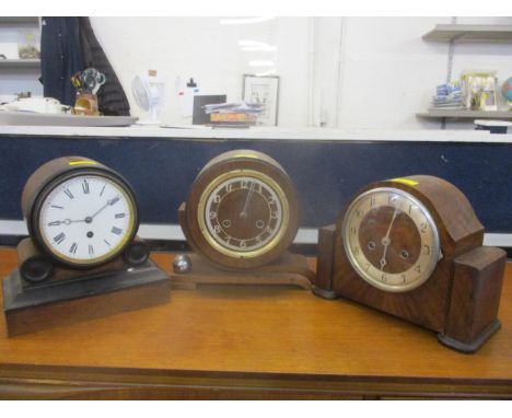 A late Victorian mahogany and ebonized cased mantel clock, white enamelled Roman dial with moon hands, movement marked R & C 