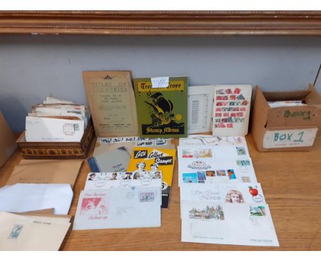 A quantity of First Day covers, franked envelopes, a stock book, loose stamps and stamp album pages Location: BWR 