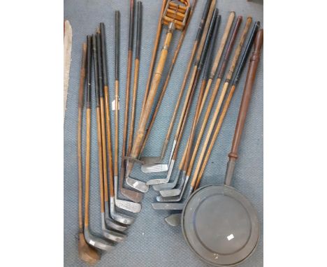 Golfing related books, mixed vintage golf clubs, walking canes, a shooting stick, a warming pan and other items,Location: RWF